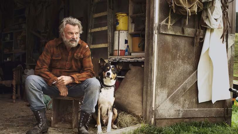 Novozelandčani se poznajo med sabo: Sam Neill je pred desetletjem igral v Waititijevi komediji o možeh iz divjine.